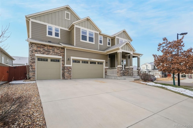 view of front of home with a garage and covered porch