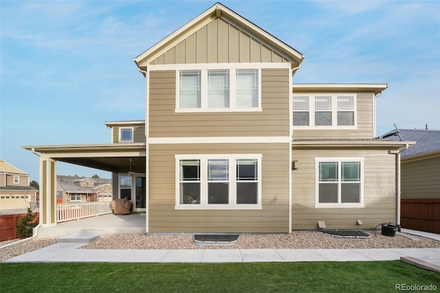 rear view of house with a patio