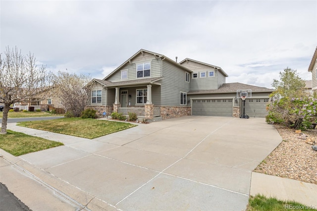 craftsman inspired home featuring a front lawn, stone siding, a garage, a porch, and concrete driveway