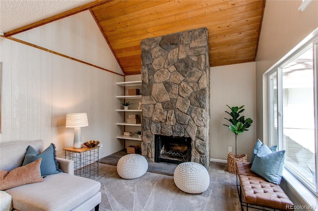 living room featuring wood ceiling, a stone fireplace, vaulted ceiling, and carpet flooring