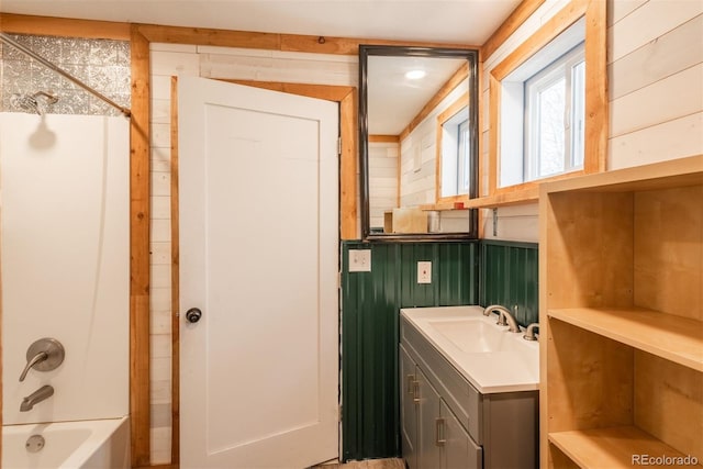 37677 Sable Ridge Rd, Elizabeth, CO 80107 - bathroom with vanity, bathtub / shower combination, and wooden walls