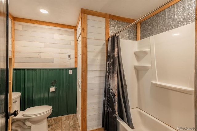 37677 Sable Ridge Rd, Elizabeth, CO 80107 - full bath featuring wood walls, toilet, shower / tub combo with curtain, wood finished floors, and recessed lighting