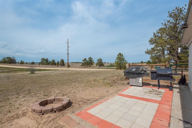 37677 Sable Ridge Rd, Elizabeth, CO 80107 - view of grassy yard with a fire pit and a patio