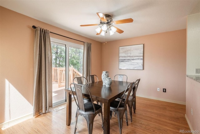 37677 Sable Ridge Rd, Elizabeth, CO 80107 - dining space with baseboards, a ceiling fan, and light wood finished floors
