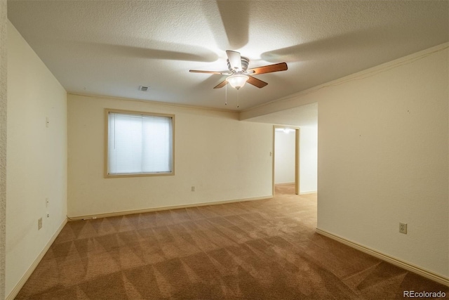 37677 Sable Ridge Rd, Elizabeth, CO 80107 - carpeted empty room featuring a ceiling fan, a textured ceiling, baseboards, and ornamental molding