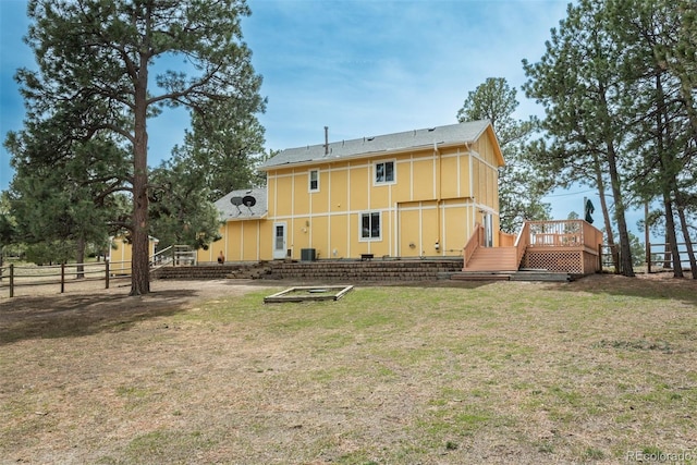 37677 Sable Ridge Rd, Elizabeth, CO 80107 - back of property featuring a deck and central AC unit