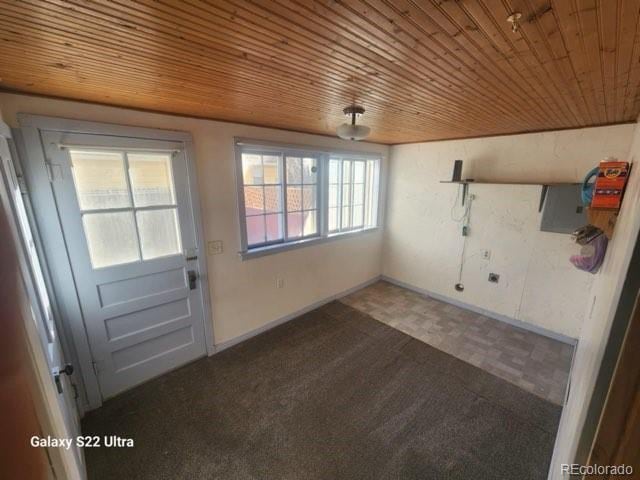 doorway featuring wood ceiling