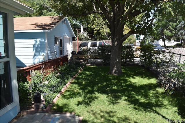 view of yard with a wooden deck