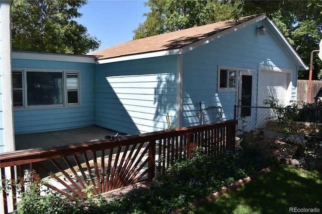 exterior space featuring a wooden deck