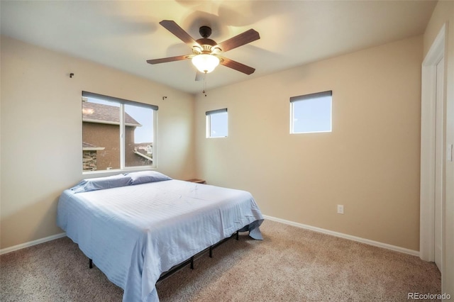 6349 Shooting Iron Way, Colorado Springs, CO 80923 - carpeted bedroom with baseboards and ceiling fan