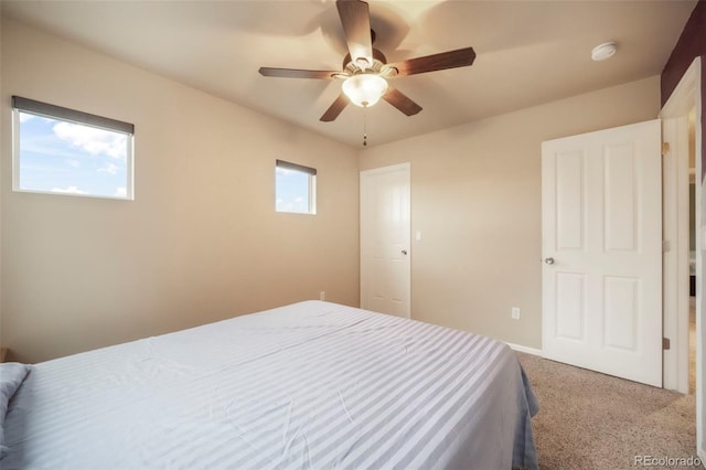 6349 Shooting Iron Way, Colorado Springs, CO 80923 - carpeted bedroom with a ceiling fan and baseboards