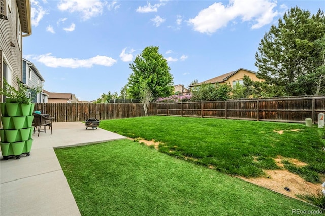 6349 Shooting Iron Way, Colorado Springs, CO 80923 - fenced backyard with a patio