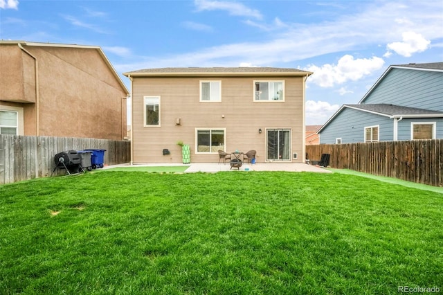 6349 Shooting Iron Way, Colorado Springs, CO 80923 - rear view of house featuring a patio area and a fenced backyard