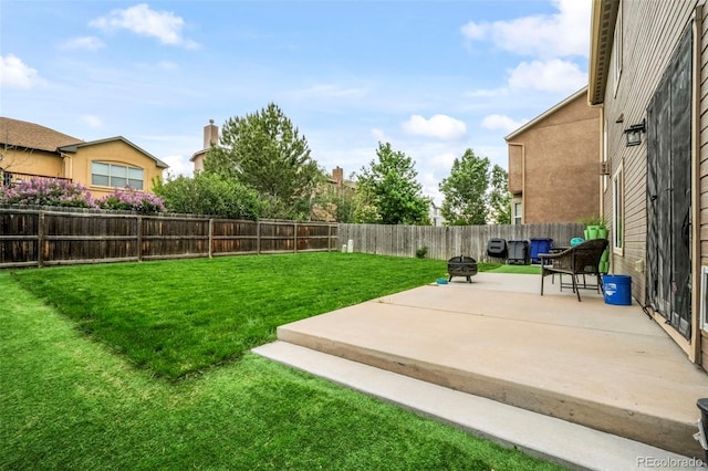 6349 Shooting Iron Way, Colorado Springs, CO 80923 - fenced backyard with a patio area