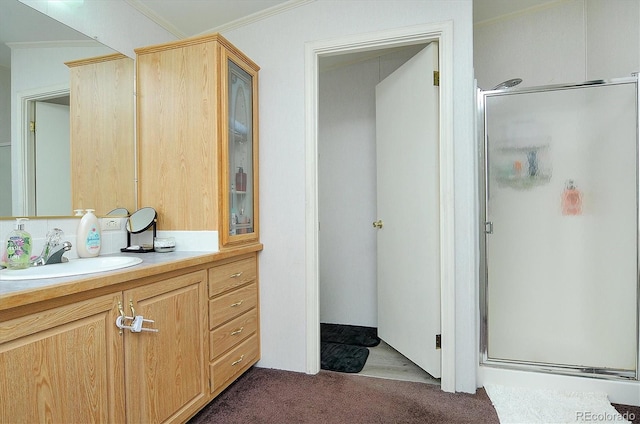 bathroom with hardwood / wood-style floors, vanity, crown molding, and a shower with shower door