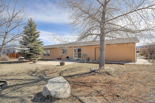 rear view of house with a patio