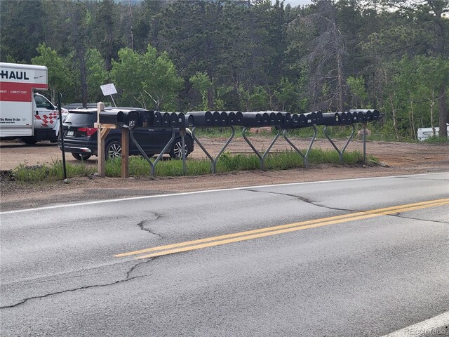 184 Signal Rock Rd, Golden, CO 80403 - view of asphalt street with a view of trees