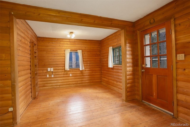 184 Signal Rock Rd, Golden, CO 80403 - foyer entrance with light wood-style floors and log walls