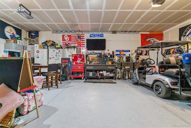 garage featuring a workshop area