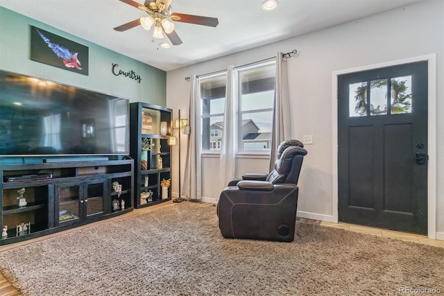 interior space featuring ceiling fan