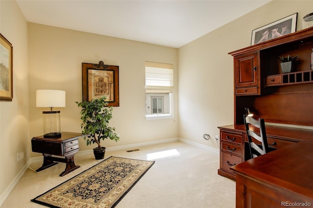 15004 Verbena St, Thornton, CO 80602 - home office with visible vents, baseboards, and light colored carpet