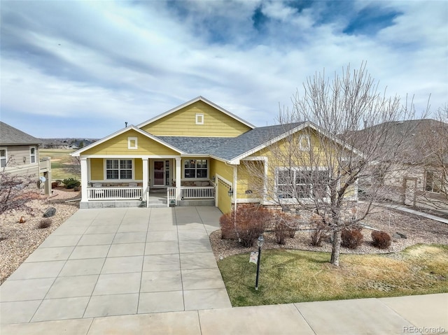 15004 Verbena St, Thornton, CO 80602 - view of front of house featuring a porch and roof with shingles