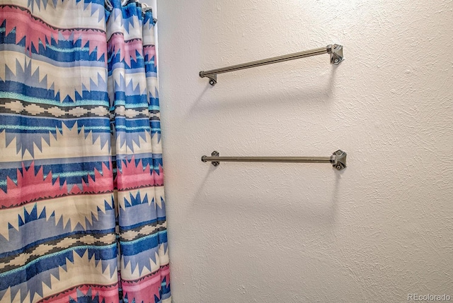 9800 Ryan Gulch Rd Unit A-101, Silverthorne, CO 80498 - bathroom featuring curtained shower