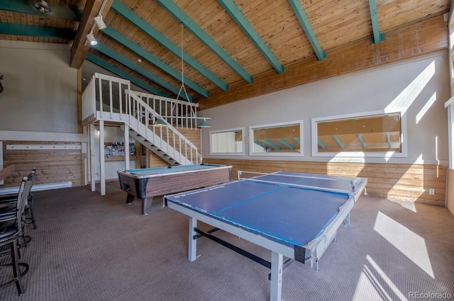 9800 Ryan Gulch Rd Unit A-101, Silverthorne, CO 80498 - rec room with billiards table, a wood ceiling with exposed beams, carpet flooring, wooden walls, and high vaulted ceiling