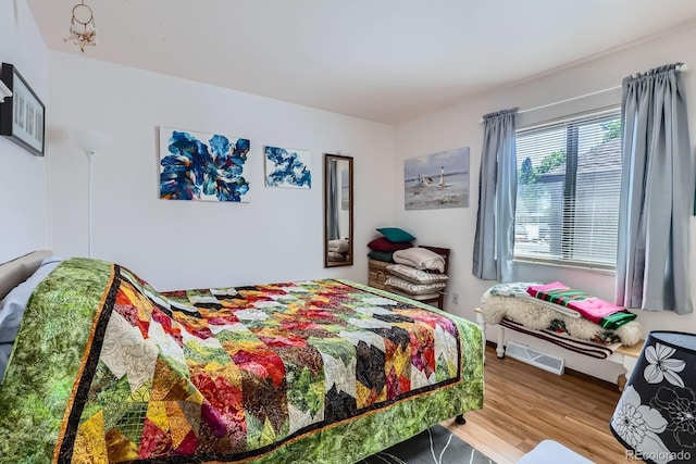 6330 E Wesley Ave, Denver, CO 80222 - bedroom featuring wood finished floors