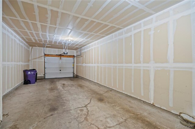 9907 Martin Luther King Blvd Unit 103, Denver, CO 80238 - garage with a garage door opener