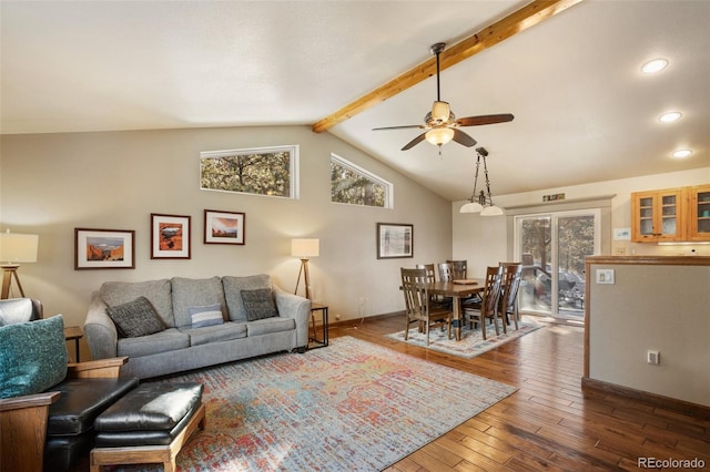 living room with hardwood / wood-style floors, lofted ceiling with beams, and ceiling fan