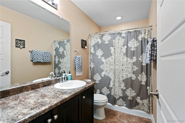 bathroom featuring vanity, curtained shower, toilet, and tile patterned flooring