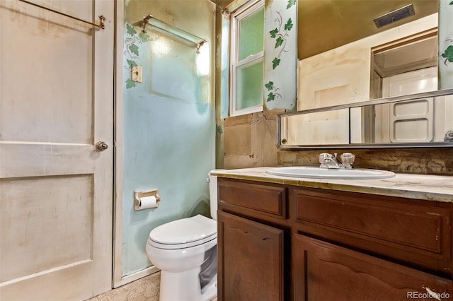 1000 Salem St, Aurora, CO 80011 - bathroom featuring vanity and toilet
