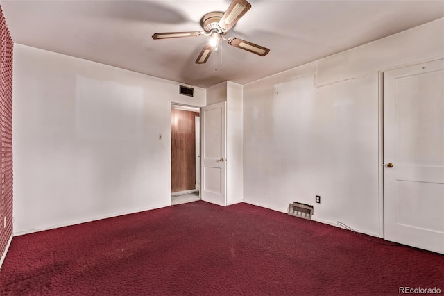 1000 Salem St, Aurora, CO 80011 - spare room with dark colored carpet and ceiling fan