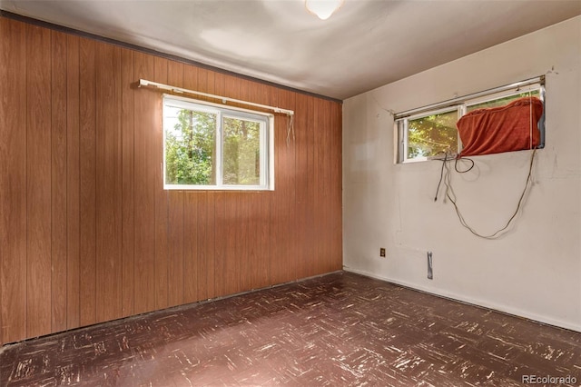 1000 Salem St, Aurora, CO 80011 - empty room featuring wood walls and baseboards