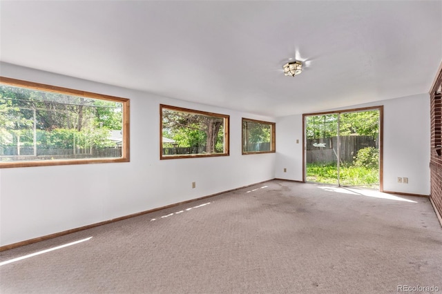 1000 Salem St, Aurora, CO 80011 - carpeted spare room featuring plenty of natural light and baseboards