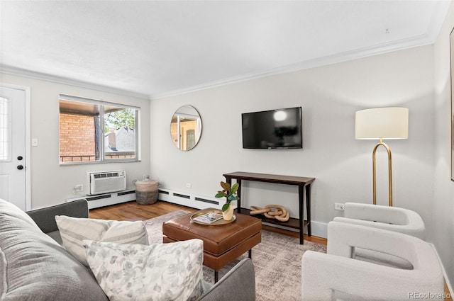 558 N Washington St Unit 305, Denver, CO 80203 - living area featuring wood finished floors, ornamental molding, an AC wall unit, a baseboard heating unit, and baseboards