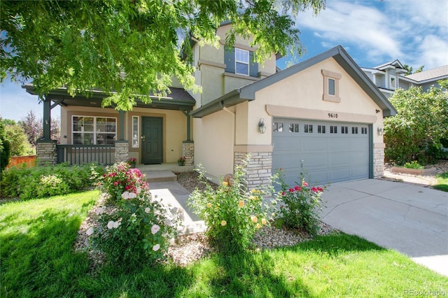9610 S Dover Way, Littleton, CO 80127 - view of front of property featuring stone siding, covered porch, stucco siding, an attached garage, and concrete driveway