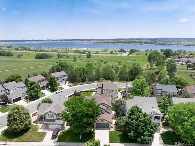 9610 S Dover Way, Littleton, CO 80127 - aerial perspective of suburban area with a nearby body of water