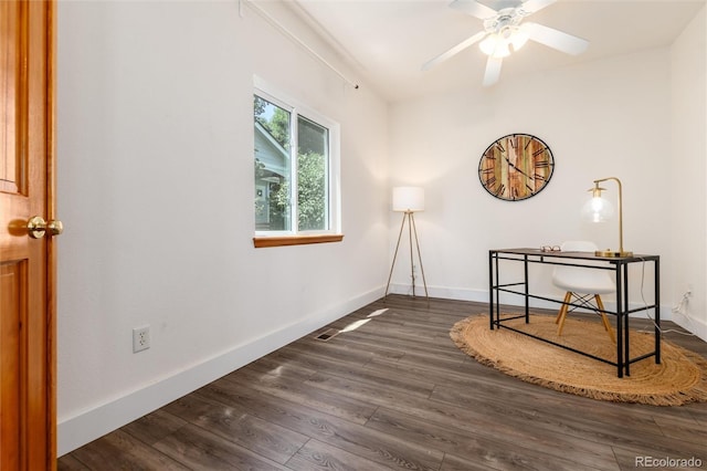 9610 S Dover Way, Littleton, CO 80127 - unfurnished room featuring dark wood finished floors, a ceiling fan, and a desk