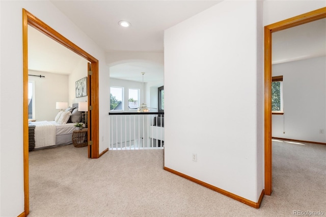 9610 S Dover Way, Littleton, CO 80127 - corridor with carpet floors, arched walkways, and recessed lighting