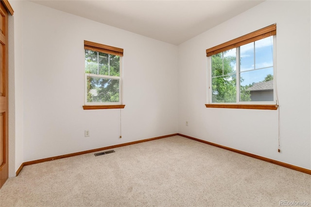 9610 S Dover Way, Littleton, CO 80127 - carpeted empty room with plenty of natural light