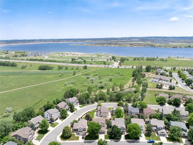 9610 S Dover Way, Littleton, CO 80127 - aerial perspective of suburban area featuring a large body of water