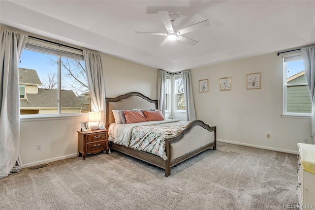 bedroom featuring carpet floors, baseboards, and visible vents