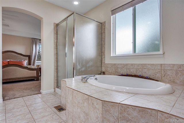 bathroom featuring a stall shower, visible vents, ensuite bath, tile patterned floors, and a garden tub