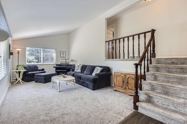 6212 S Ash Cir W, Centennial, CO 80121 - living area featuring stairway, vaulted ceiling, and wood finished floors