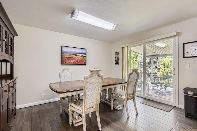 6212 S Ash Cir W, Centennial, CO 80121 - dining space featuring dark wood-style floors and baseboards