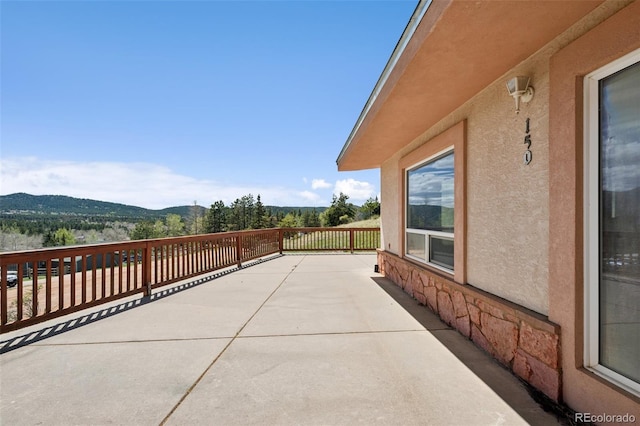 150 Apache Trl, Woodland Park, CO 80863 - view of patio / terrace featuring a mountain view