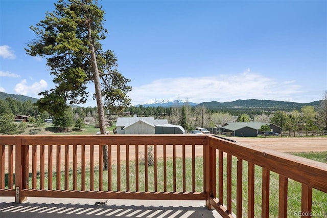 150 Apache Trl, Woodland Park, CO 80863 - wooden deck featuring a mountain view