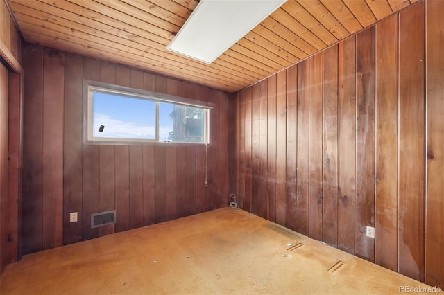 150 Apache Trl, Woodland Park, CO 80863 - empty room with wooden ceiling, wooden walls, and a skylight